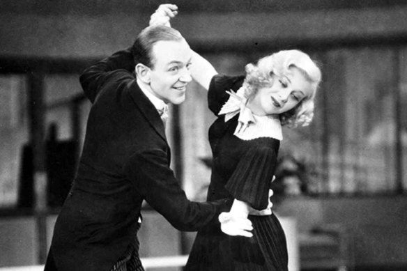 Fred Astaire and Ginger Rogers go through their paces in the 1936 film, Swing Time.