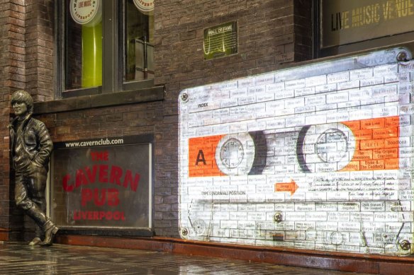 The mysterious cassette tape, projected onto the wall of the Cavern Club next to John Lennon’s statue, to promote the release of ‘Now And Then’.