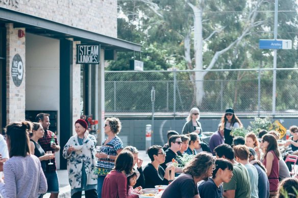 Apartment residents catch up in Melbourne’s inner north.