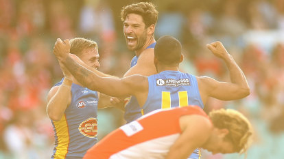 Gold Coast upset Swans in front of 2012 premiers