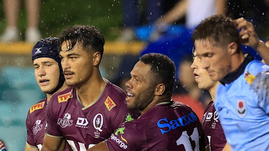 Jordan Petaia celebrates a try  for the Reds against NSW at Leichhardt Oval,