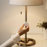 IKEA's Tradfri dimmer can be stuck anywhere and operated with a twist.