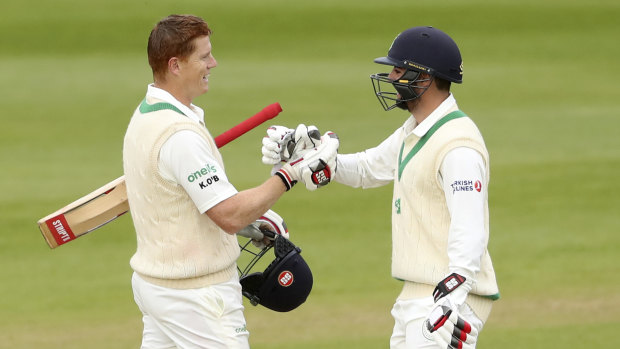 Kevin O'Brien (left) became the first player to score a Test century for Ireland.