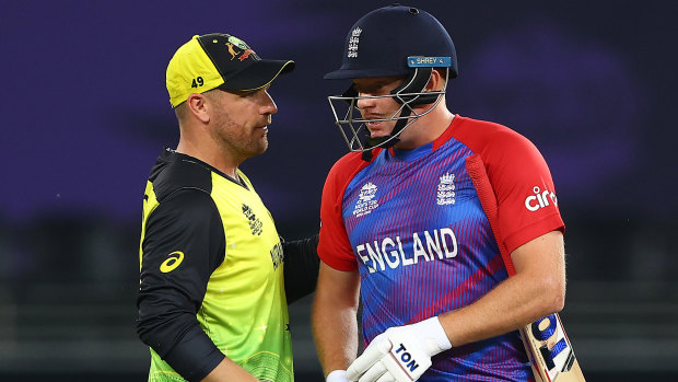Australia captain Aaron Finch and England’s Jonny Bairstow interact following their T20 World Cup match.