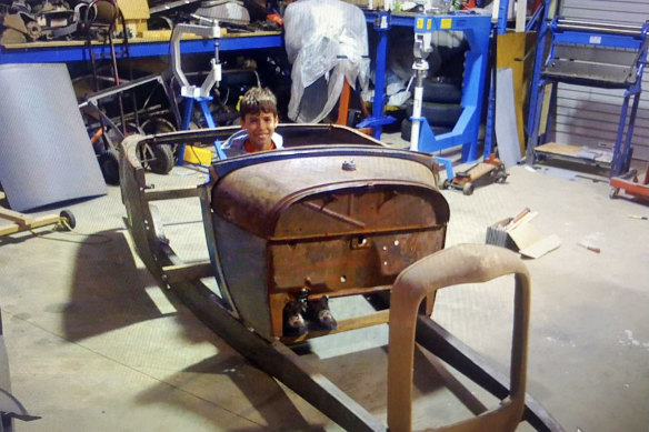 Alex Morris at the age of 12 on his first hot rod project.