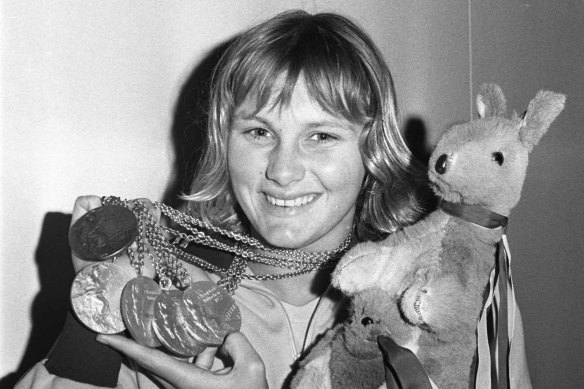 Fifteen-year-old Shane Gould shows off her five medals from the 1972 Olympics.