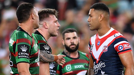 Jai Arrow greets Roosters rookie Daniel Suluka-Fifita after being sent to the bin.