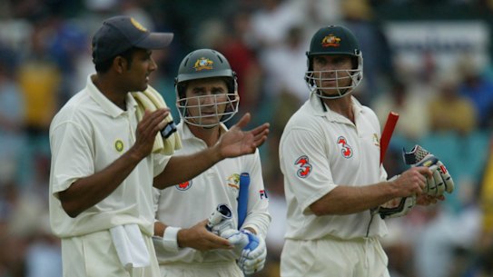 Australian batsmen Justin Langer and Matthew Hayden keep an eye on Anil Kumble, who was nearly unstoppable in 2014.