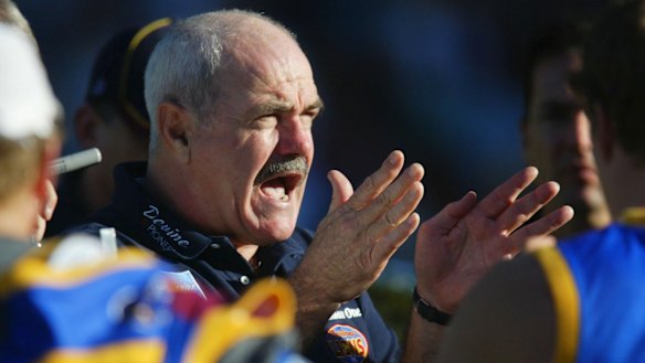 Hawthorn icon Leigh Matthews coaching Brisbane players in 2002. 