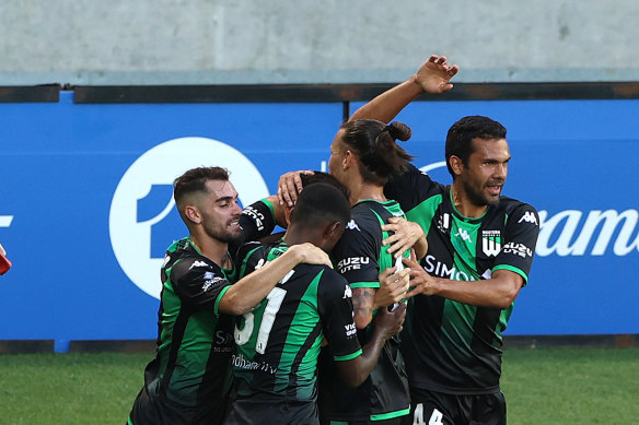 Steven Lustica is congratulated after scoring the winner against Sydney FC.