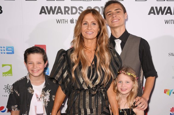 Kasey Chambers with children Arlo (left), Poet (right) and Talon (second, right) at the 2018 ARIA Awards, where she was inducted into the Hall of Fame. 