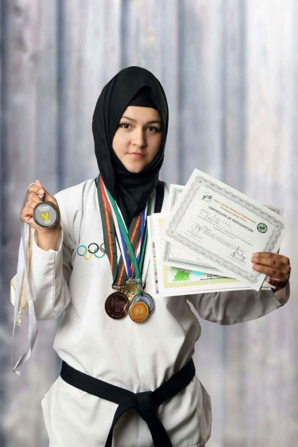 Arifa Hakimi in 2016 with the three gold, two silver and one bronze medals she won at the National Games 2014-2015 and 2016.