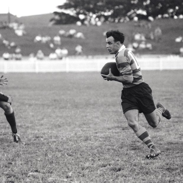 South Sydney fullback Clive Churchill receives a pass from Greg Hawick and has winger Ian Moir on his outside against Wests Sydney at Redfern Oval in 1953. 