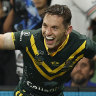 Cameron Murray celebrates after making history for the Kangaroos.