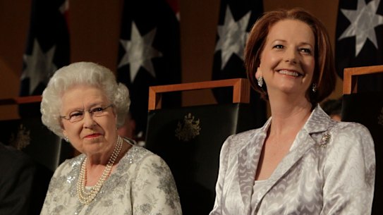 The Queen accompanied by former Australian prime minister Julia Gillard in 2011.