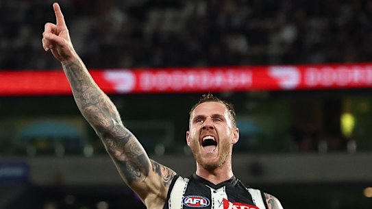 Tim Membrey of the Magpies kicks a goal.