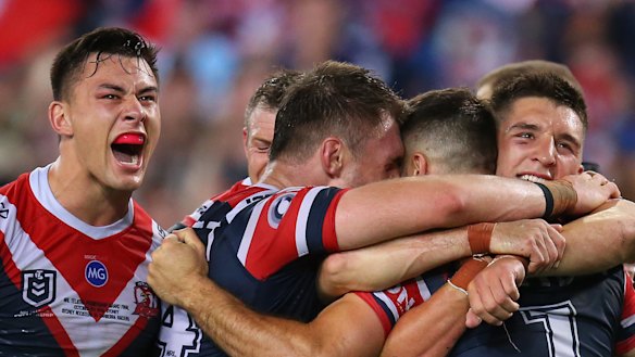 James Tedesco of the Roosters scores a try during the 2019 NRL grand final match between the Canberra Raiders and the Sydney Roosters at ANZ Stadium.