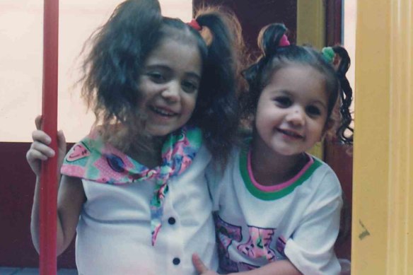 Zoe Lantry (left) with her sister at the old Camperdown children’s hospital playground.
