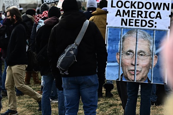 Anti-vaccine protesters set their sights on Fauci at the January 2022 Defeat the Mandates rally in Washington.