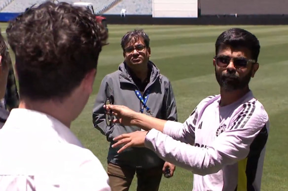 The Indian team’s media manager Moulin Parikh clashes with Australian reporters on Saturday.