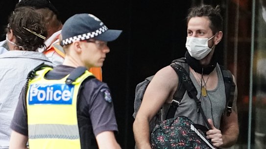 Travellers returning from overseas were taken to Melbourne hotels on Sunday to begin their 14-day quarantine.