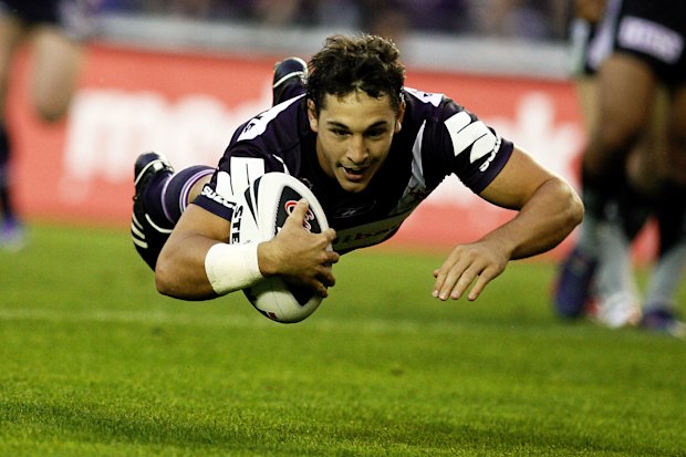 Flying high … Billy Slater scores a try against the Warriors in 2008.