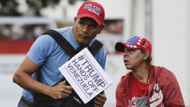 Supporters of Venezuela's President Nicolas Maduro attend an “anti-intervention” march on Wednesday.