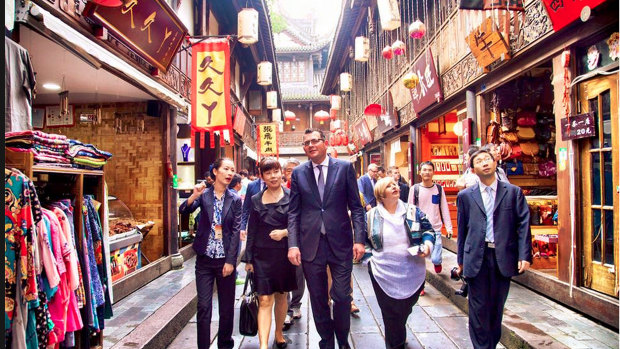 Daniel Andrews, pictured here visiting Chengdu, China, in 2015, could help mend the relationship between Beijing and Canberra, a China expert says.  