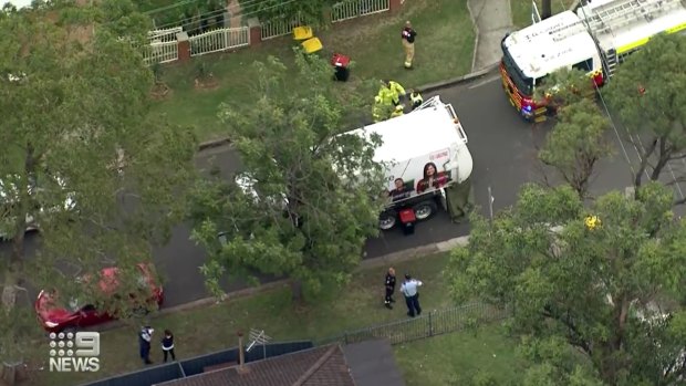 A woman has died after she was struck by a garbage truck in Sydney’s west on Tuesday.