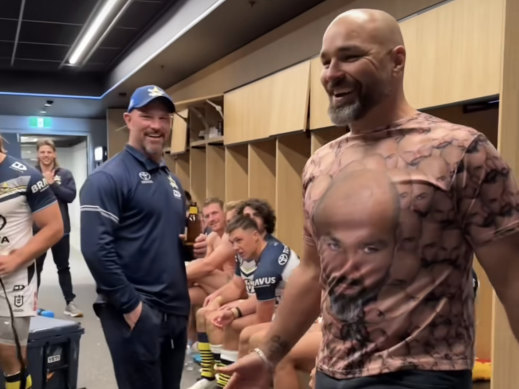 Funky Cowboy: Todd Payten rocks a shirt covered with his own face after the win over Souths.