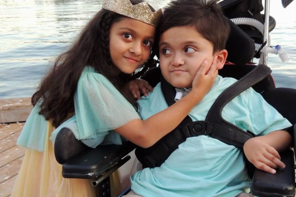 Shaffan (right), 9, has a rare genetic condition that meant his family faced deportation to Pakistan before Immigration Minister Andrew Giles intervened.