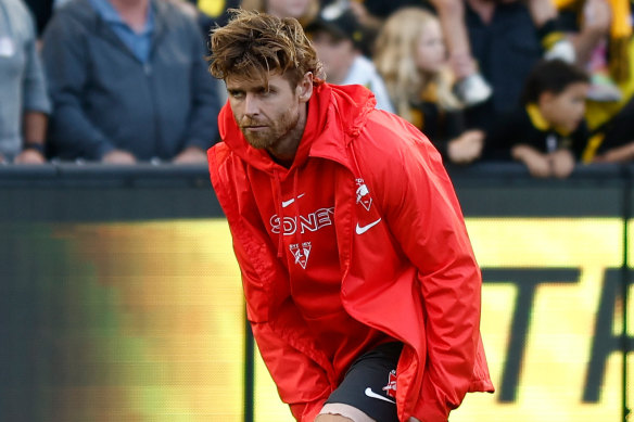 Dane Rampe holds his hamstring.