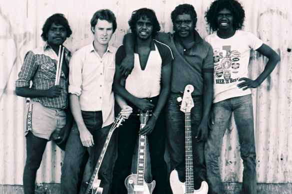 The Warumpi Band in Papunya in 1981, from left, Gordon Butcher, Neil Murray, Sammy Butcher, Denis Minor and George Rrurrambu (deceased).