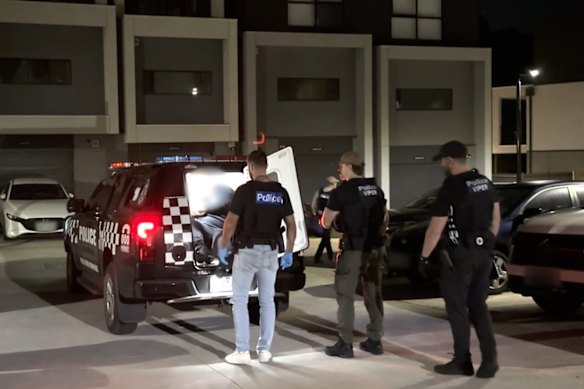 Detectives from Taskforce Hawk arrest Napoleon Brown at Mill Park on Wednesday morning.