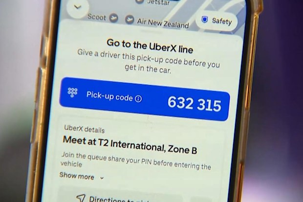 A woman says she feared for her life after an Uber driver at Melbourne Airport tried to scam her and locked her in his vehicle.