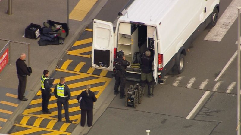 ‘Total shutdown’: Arrest over Avalon bomb scare as travellers face chaos