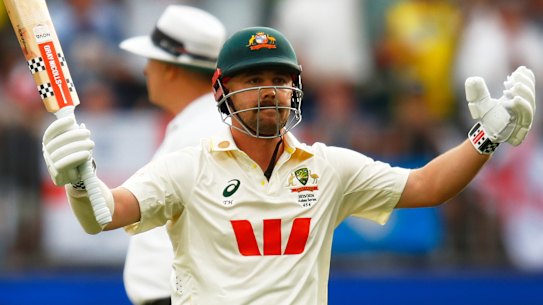 Australia’s Travis Head celebrates his century on day two of the first Ashes cricket test match between Australia and England in Perth.