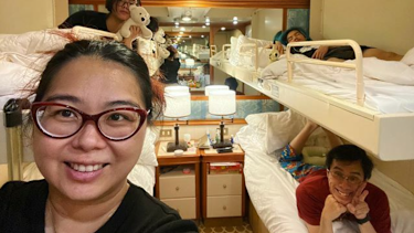 In for the long haul: Australian woman Aun Na Tan and her family in their cabin on board the Diamond Princess, which has been docked in quarantine in Yokohama due to the coronavirus outbreak.