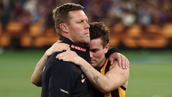 Hawthorn coach Sam Mitchell and gutted superstar Nick Watson after an MCG classic to remember.