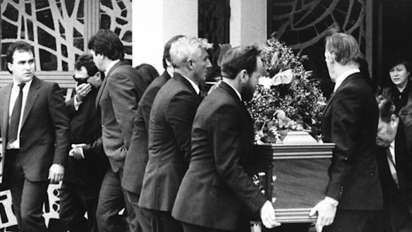 The funeral of Robert Trimbole at St Benedicts Church at Smithfield. Trimbole's son, Craig, is second from left and is covering his face. May 27, 1987.