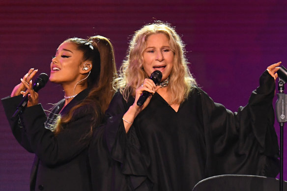 On stage in Chicago with Ariana Grande in 2019 singing No More Tears (Enough is Enough).