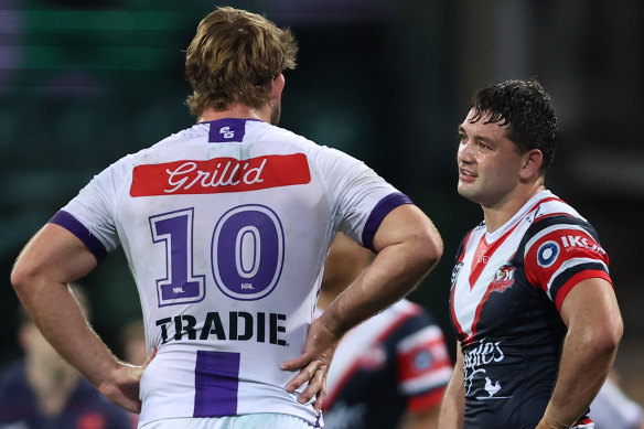 Brandon Smith with former Storm teammate Christian Welch after his NRL return last week.