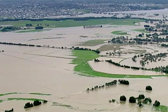 Aerial stills show floodwaters in the town of Yallourn. 