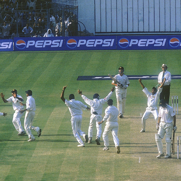 India celebrate the wicket of Jason Gillespie as they close in on victory at Eden Gardens
