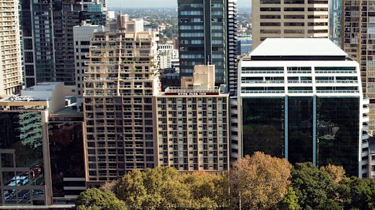 The acquisition comprises Hyde Park Inn, centre, and a smaller office building behind it at 262 Castlereagh Street.