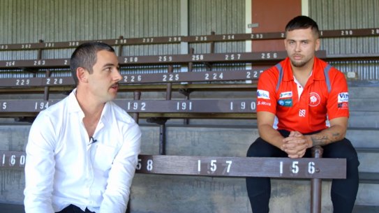 Taylor Walker alongside Robbie Young.