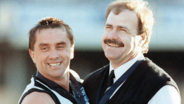 Collingwood's premiership winning captain Tony Shaw with coach Leigh Matthews in 1990.