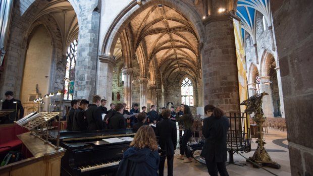 The music tour choir performing at St Giles Cathedral on the Royal Mile, in Edinburgh.