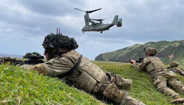 US troops simulate an amphibious air assault during a training exercise on Batan island on April 23.