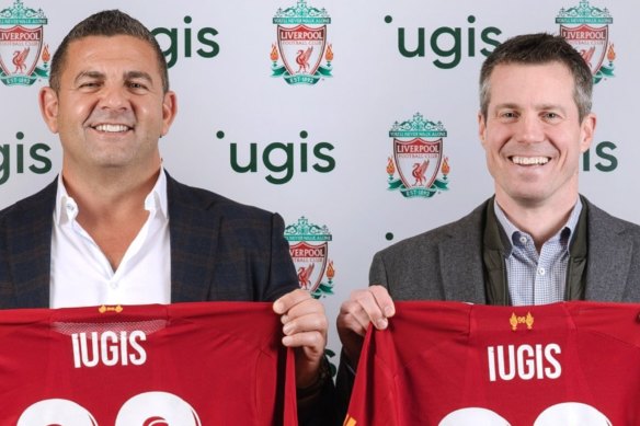 Forum Group CEO Bill Papas, left. announcing a partnership between Iugis and Liverpool FC in February 2020. 